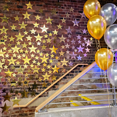 Theatre Royal Wakefield's wall of fame, hundreds of gold metal stars on a brick wall