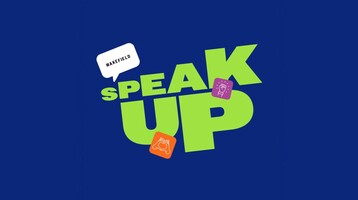 The Wakefield Speak Up logo, green text on a blue background